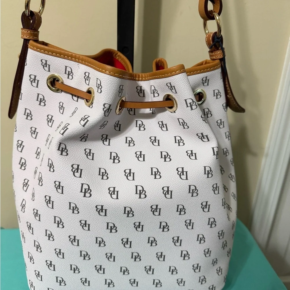 Dooney & Bourke White and Tan Drawstring Bag